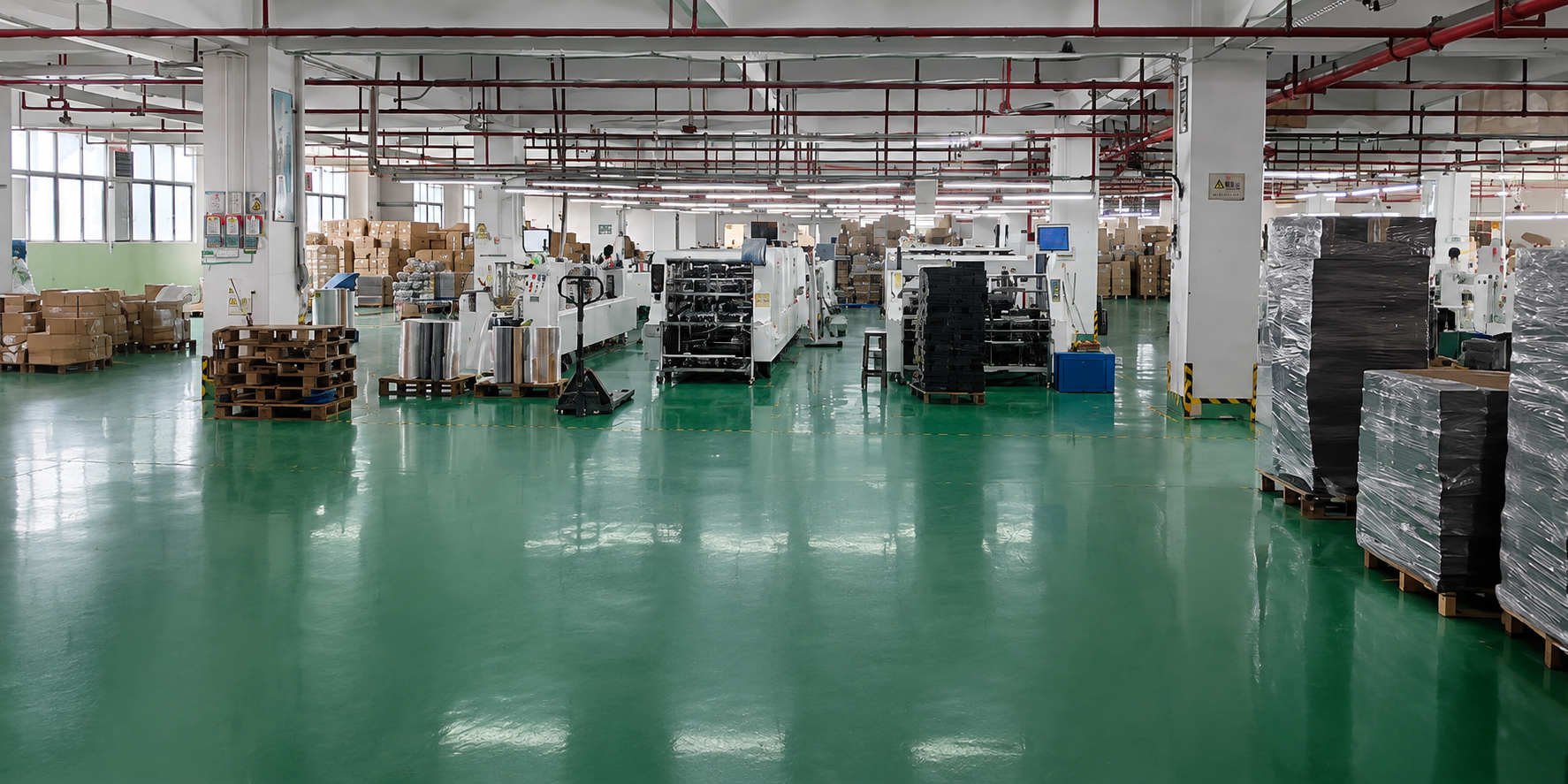 Wide view of the clean XJY paper packaging production floor