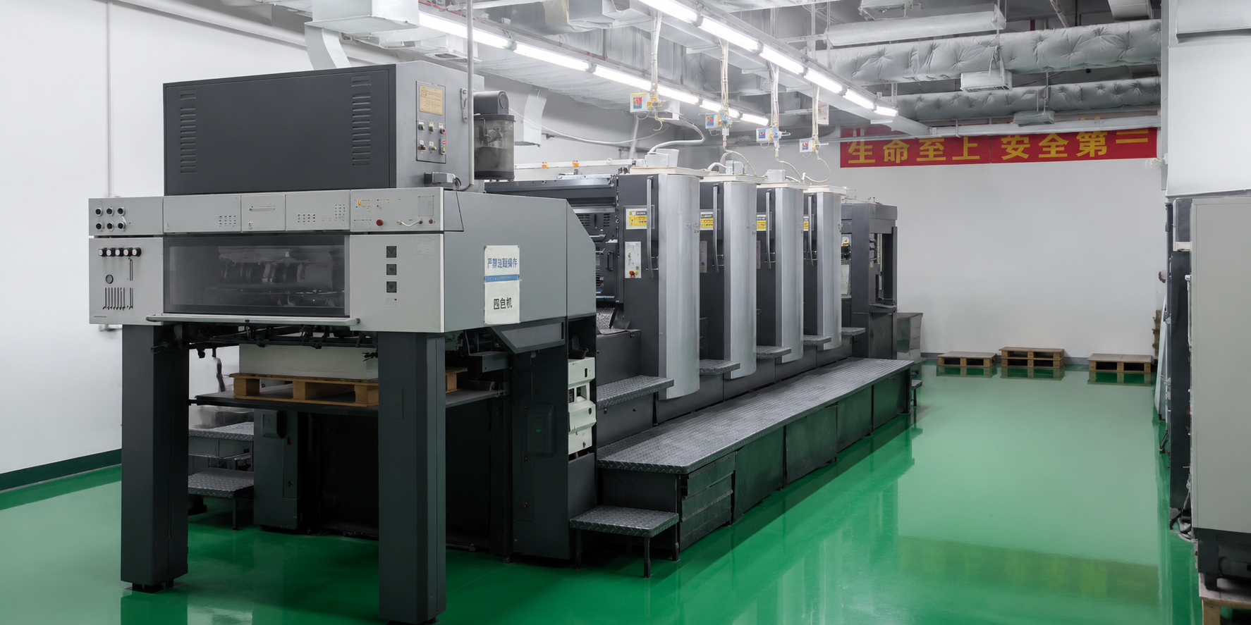 Sheet-fed offset printing press inside the XJY factory