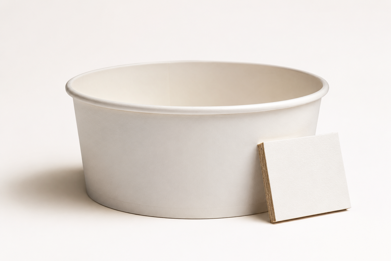 White paperboard bowls and board cross-section samples